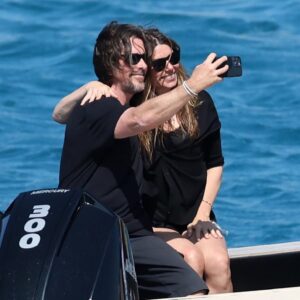 Christian Bale and Sibi Blazic on a private escape, joined by top celebrities in Mykonos this season.