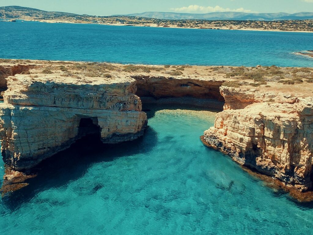 Discovering the hidden turquoise gems of Koufonisia, a highlight of our island hopping from Mykonos itinerary.