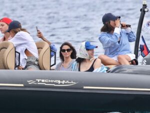 Greek fashion icon Iliana Papageorgiou enjoying a stylish boat trip, a favorite for celebrities in Mykonos.