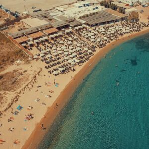 The wilder, bohemian side of Mykonos beaches at Panormos, accessible in style with a Don Blue Yachting private transfer.