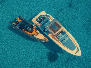 Our luxury yacht and chase boat anchored off the coast, providing premium access to all the best things to do in Naxos Chora.