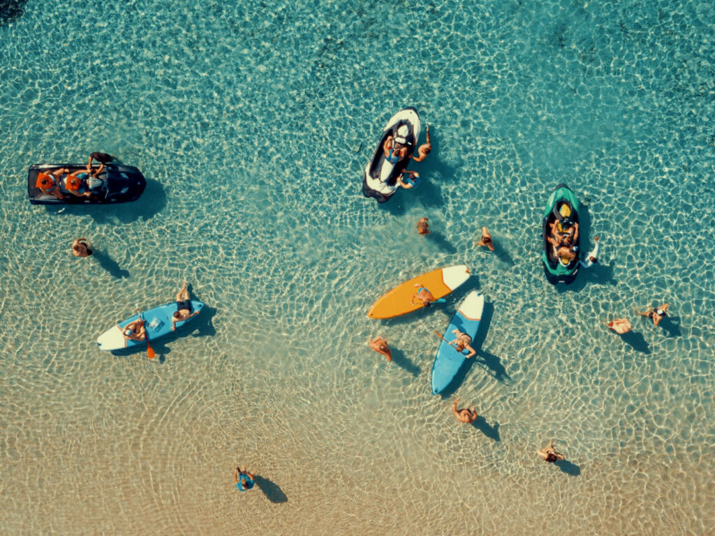 Thrilling SUP & Seabob action and water sports for high-energy team-building exercises during corporate retreats at sea with Don Blue Yachting.