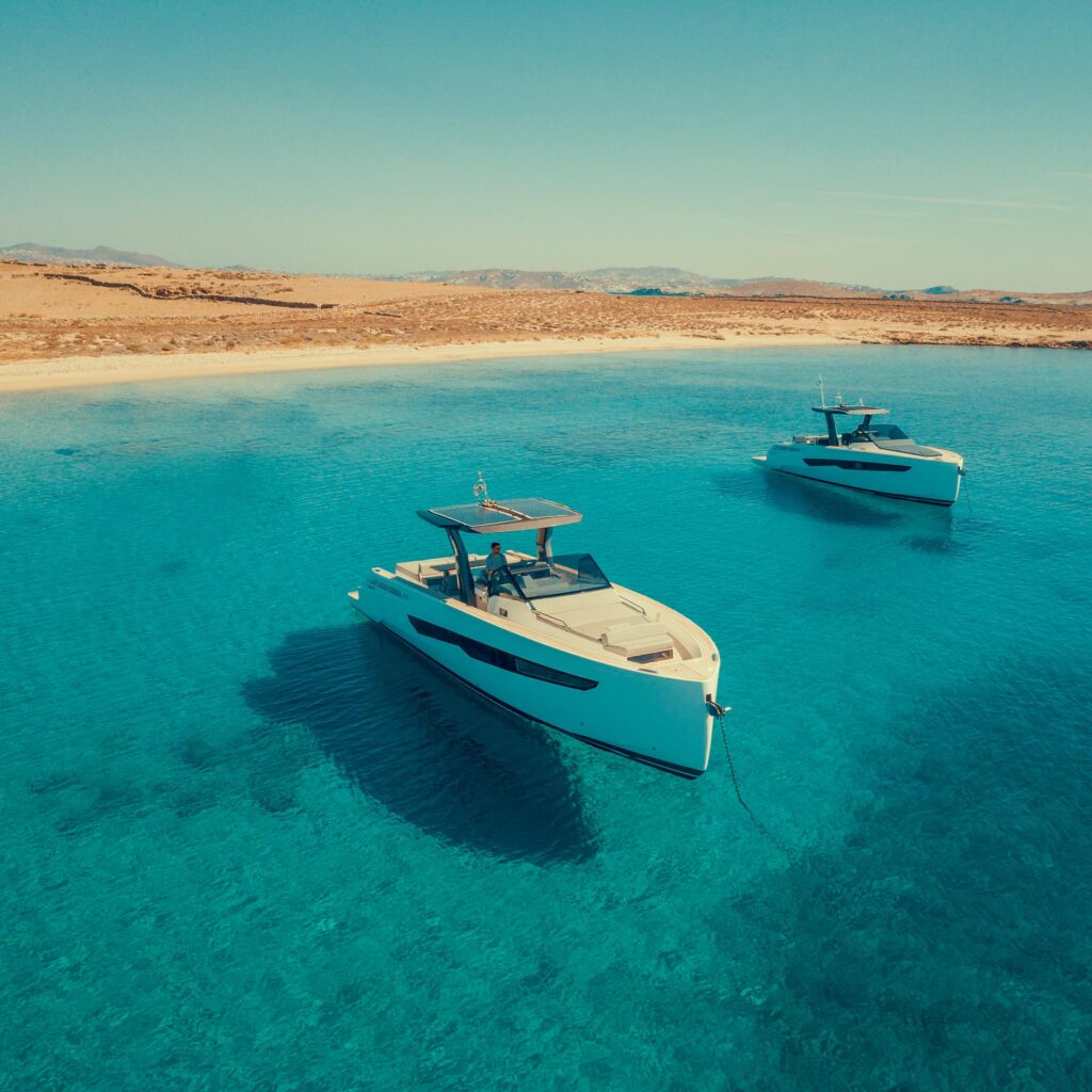 A Fiart yacht anchored in the turquoise waters of Easter in Mykonos.