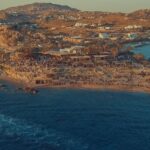 The bohemian sunset ritual setting at Scorpios Mykonos for the scorpios parties 2026 season.