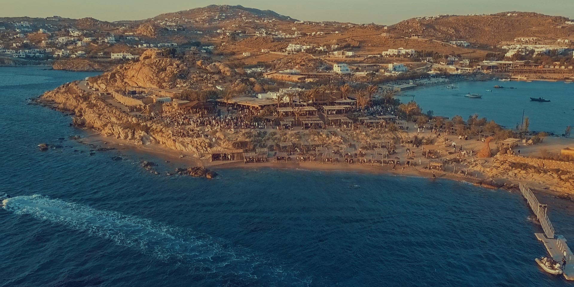 The bohemian sunset ritual setting at Scorpios Mykonos for the scorpios parties 2026 season.