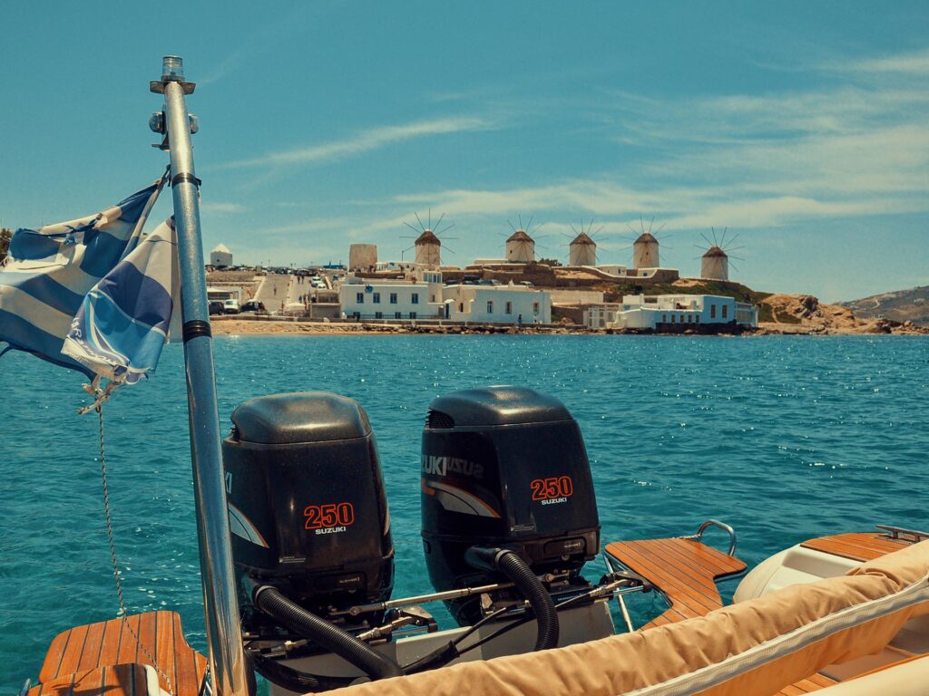 View of the white Windmills of Mykonos from the sea.