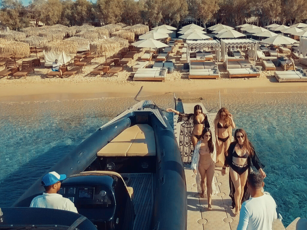 A panoramic shot from a Don Blue Yachting boat approaching Paraga beach for the exclusive SantAnna Parties 2026.