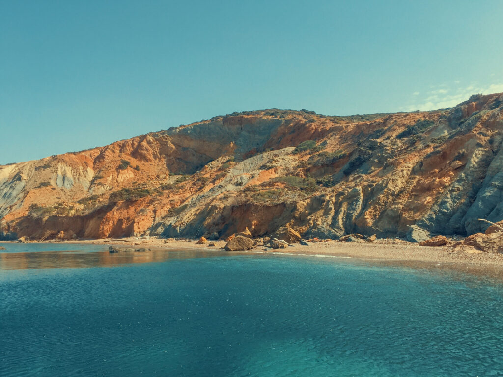 A secluded cove on the north coast of Paros combining dramatic rocks and a private bay accessible only by boat — the kind of hidden spot Don Blue Yachting takes you to on a best beaches Paros cruise