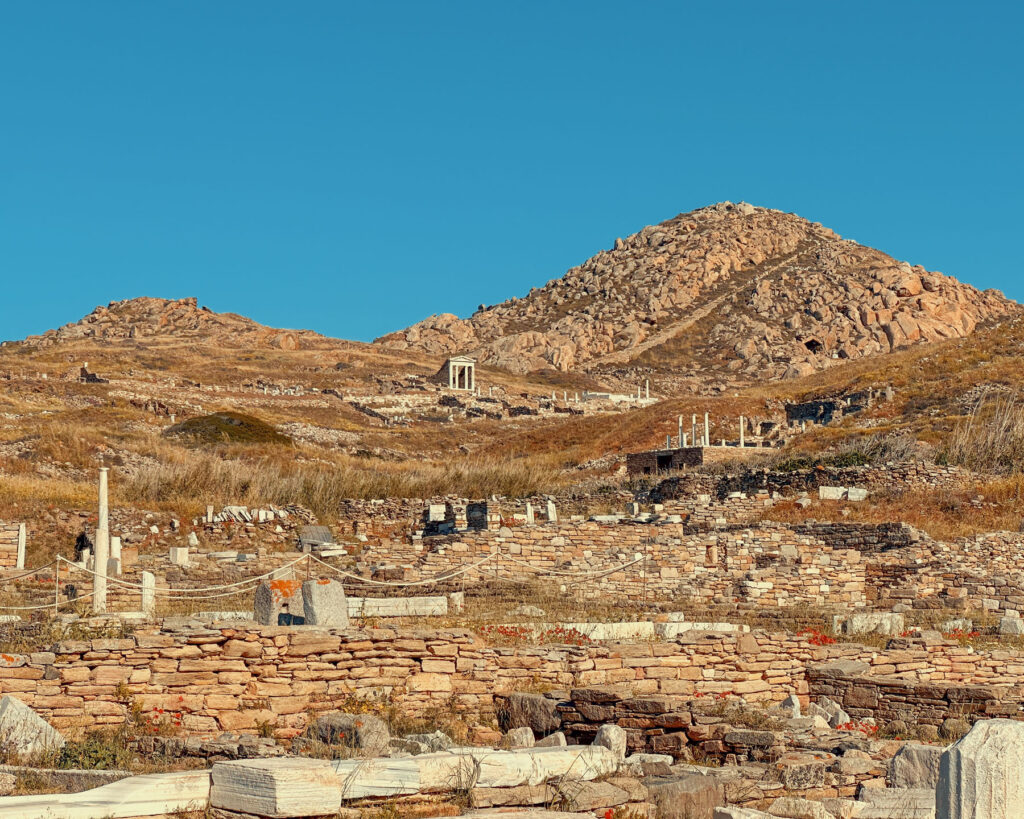 Guided tour of the ancient Delos archaeological site during Camila Cabello's Mykonos cruise with Don Blue Yachting