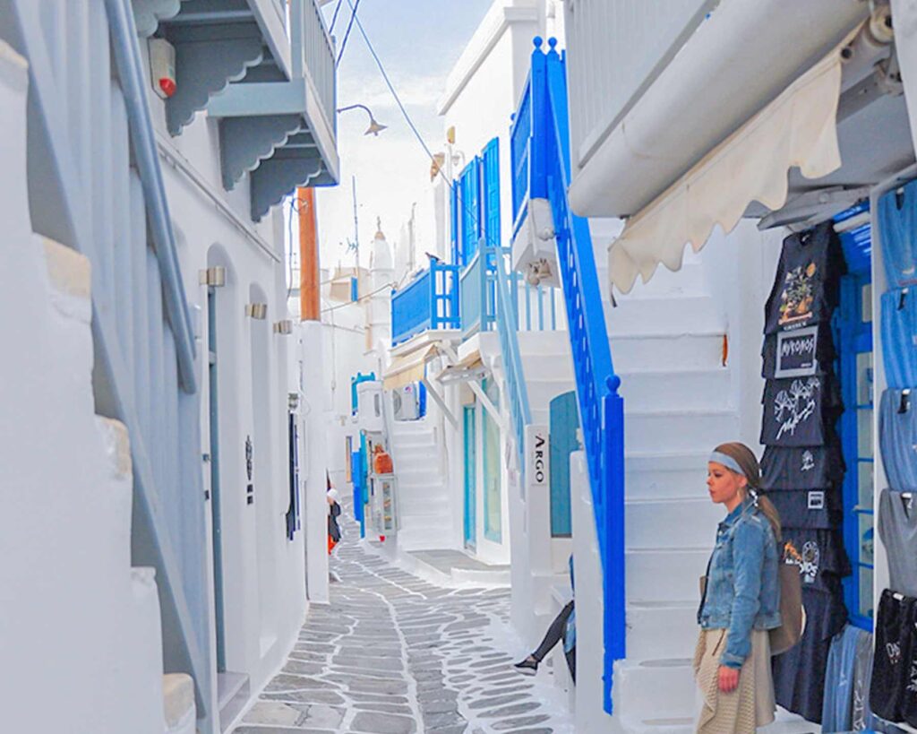 The winding whitewashed alleys of Mykonos Town Chora — the perfect final stop on a one day in Mykonos itinerary after a private cruise with Don Blue Yachting