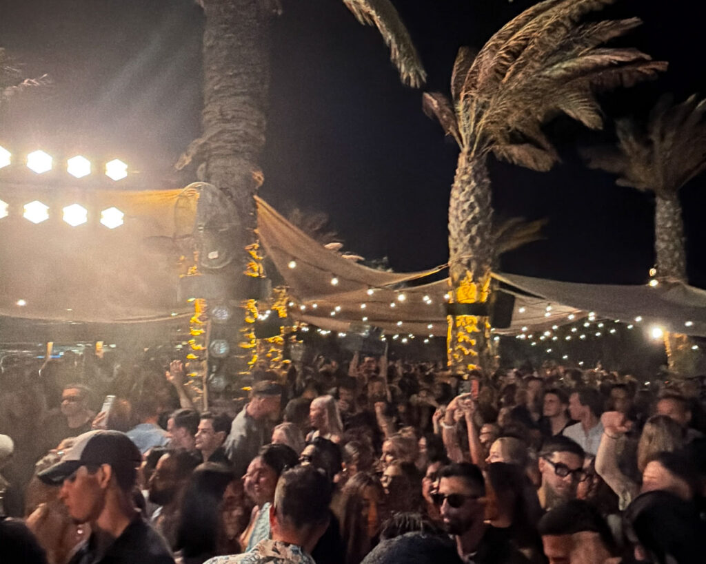 Full house at Scorpios Mykonos on the night of the PAWSA July 19 2026 Music Ritual — every seat taken, every transfer handled by Don Blue Yachting