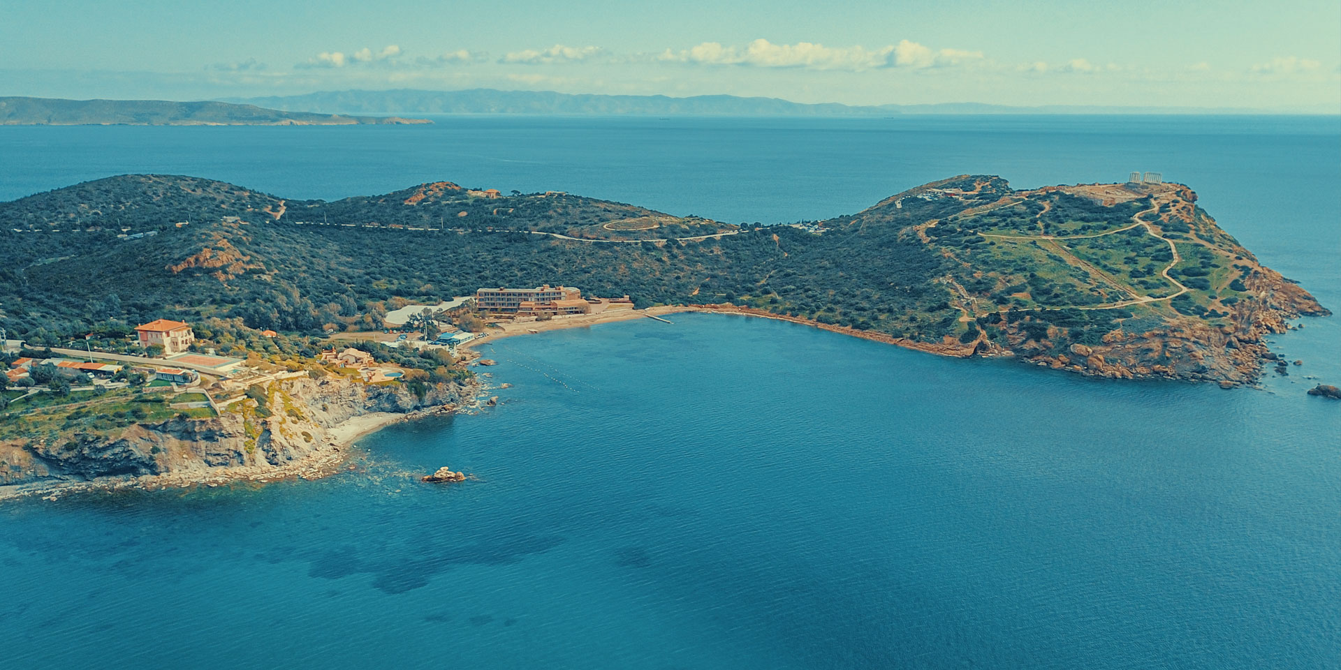 The Temple of Poseidon at Cape Sounio seen from the water on a Don Blue Yachting Athenian Riviera by boat cruise