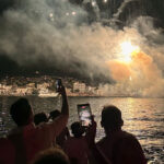 The burning replica Ottoman flagship and fireworks display during the Armata Spetses festival watched from a Don Blue Yachting private boat
